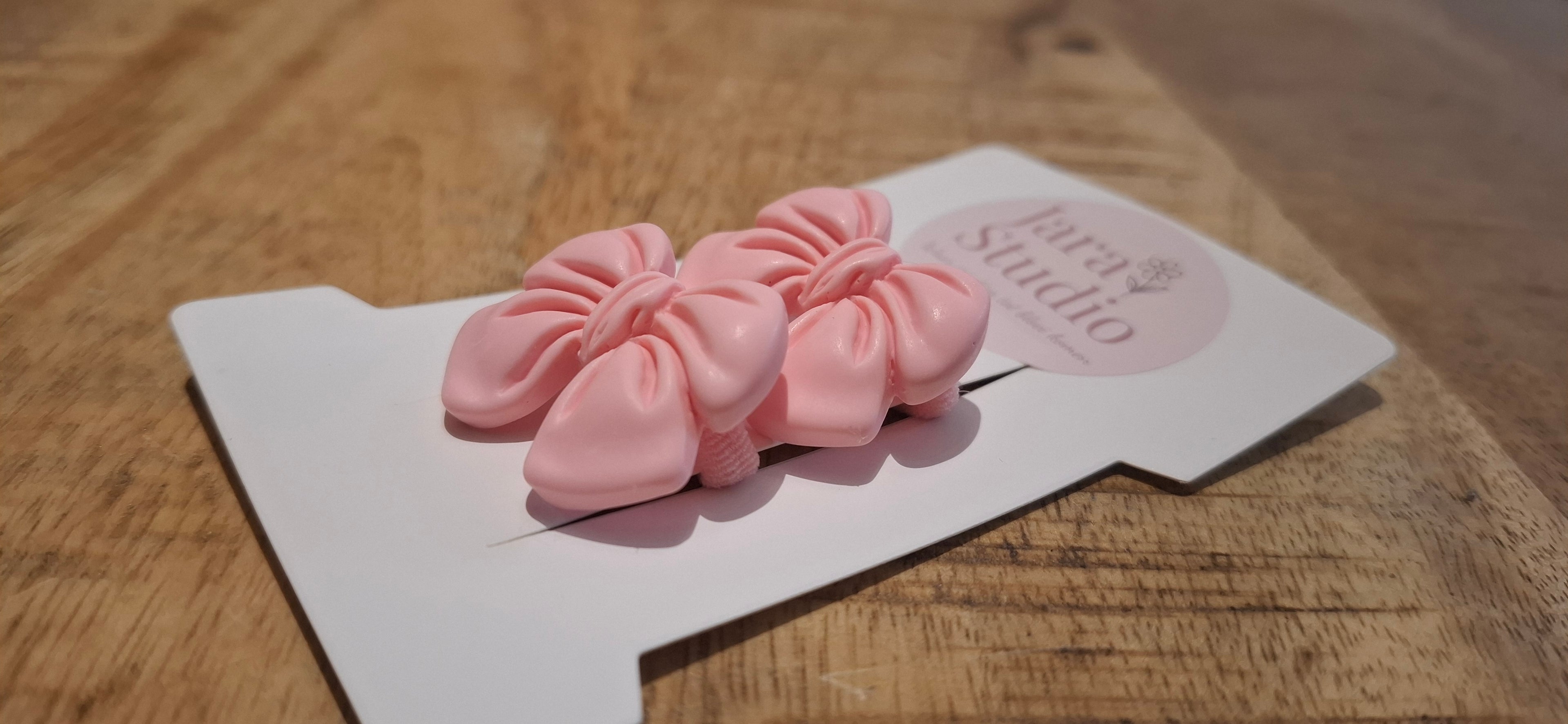 Elastiekje strik roze